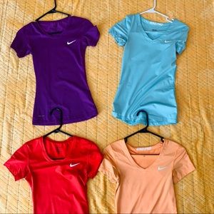 FOUR Nike DRI-Fit XS shirts.